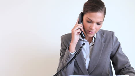 Businesswoman-working-on-documents