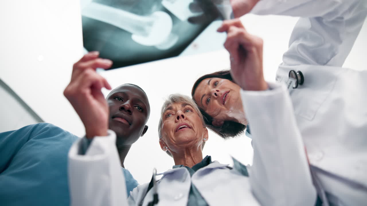 Doctors examining an x-ray