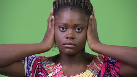 young african woman doing three wise monkeys concept