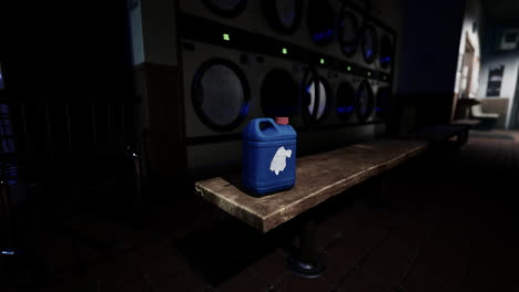 empty laundry room with detergent jug on bench