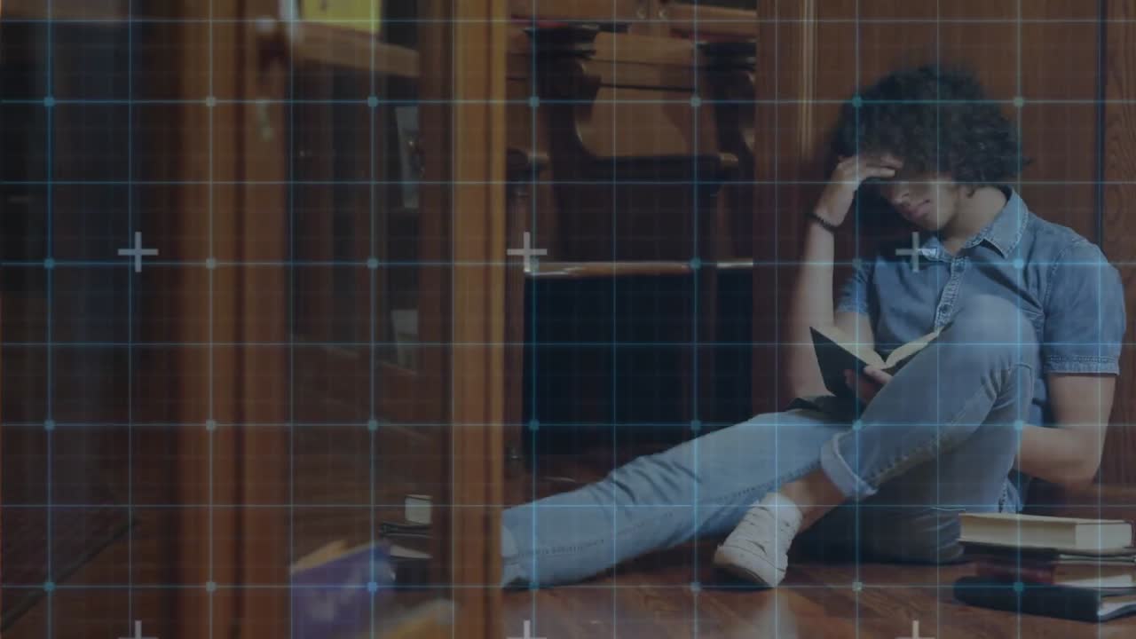 대학 도서관에서 공부하는 백인 남성 학생에 대한 그리드 네트워크