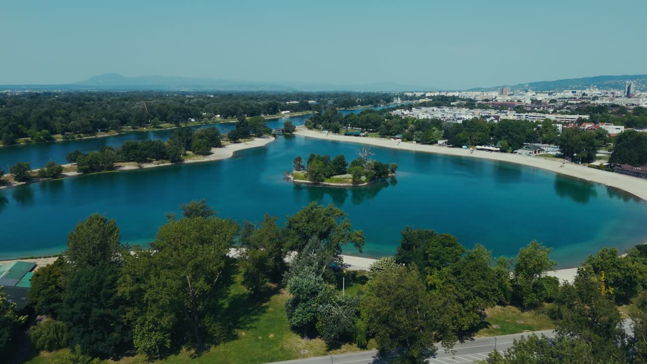 blue water and tree lined islands shine in Lake Jarun near Zagreb
