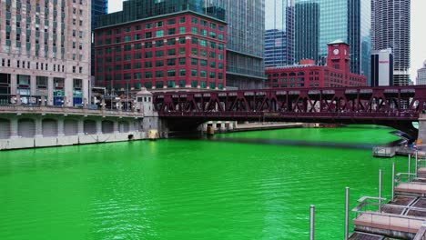 red-building-and-green-river