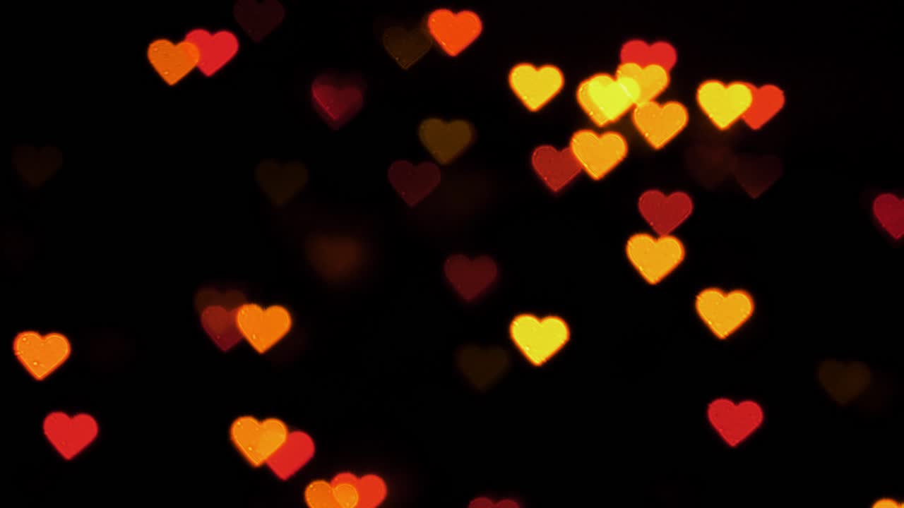 bokeh de hermosos corazones de luces intermitentes, día de san valentín, día de la boda o medios sociales como concepto de fondo