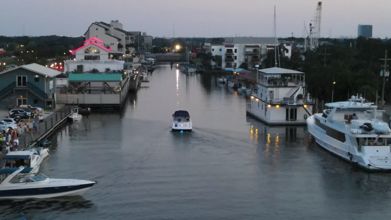 Motorboat Sailing Towards The Building Structures In New Orleans, USA. aerial