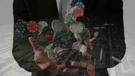 man holding poker chips