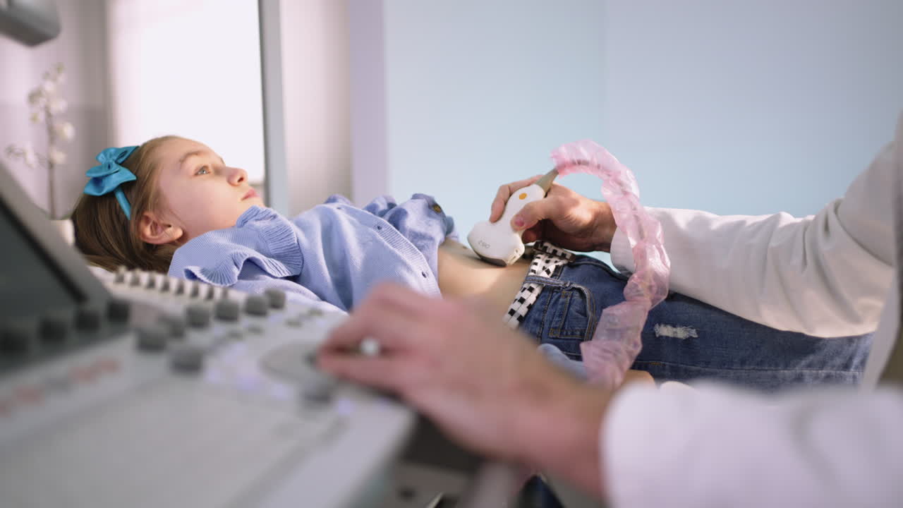 A young girl undergoing an ultrasound examination