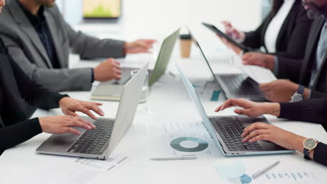 Hands-of-business-people-at-meeting