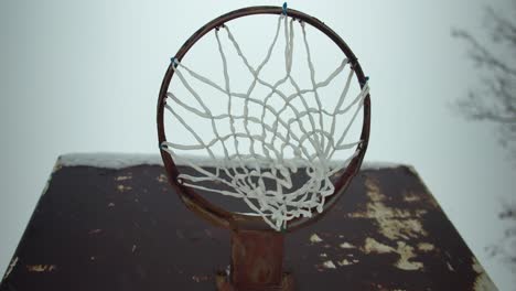 basketball hoop in slow motion snow