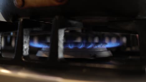 turning on gas stove burners