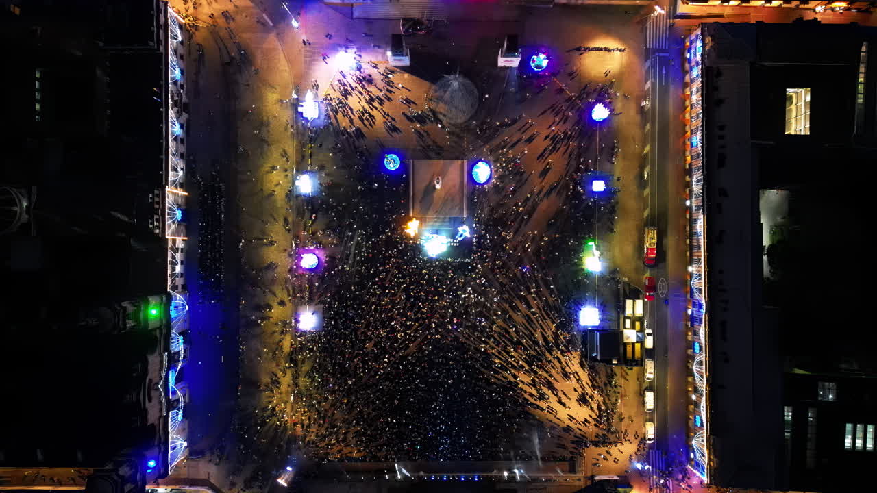 Aerial drone view of the Plaza de Bolivar in Bogota at night, during a massive public gathering