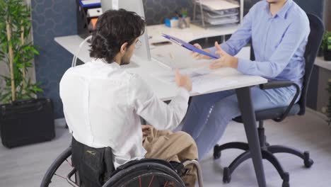 disability rights. disabled worker applying for a job.