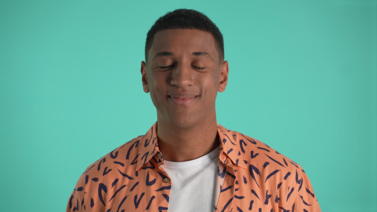 Young african american man smiling on camera