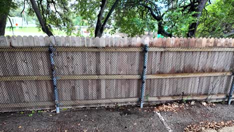 view of backside of grassy knoll fence