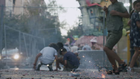 children throw firecrackers on the streets