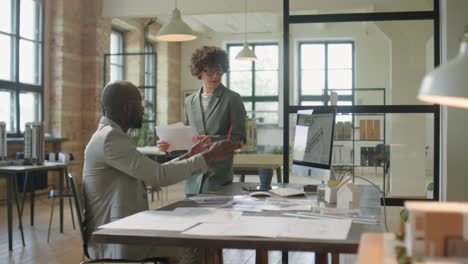 architects collaborating on a project in an office