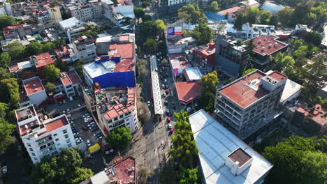 Mexico-City-Aerial-Drone-at-Magic-Hour,-Birds-Eye,-Tilt-up-to-Skyline-straight-on