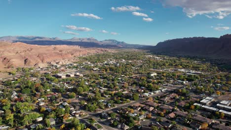 static drone shot looking over moab, utah on a sunny day