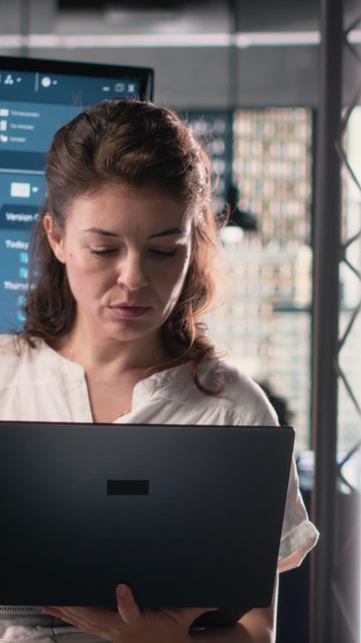 Vertical Video Woman real estate developer works with 3D tools and digital blueprints