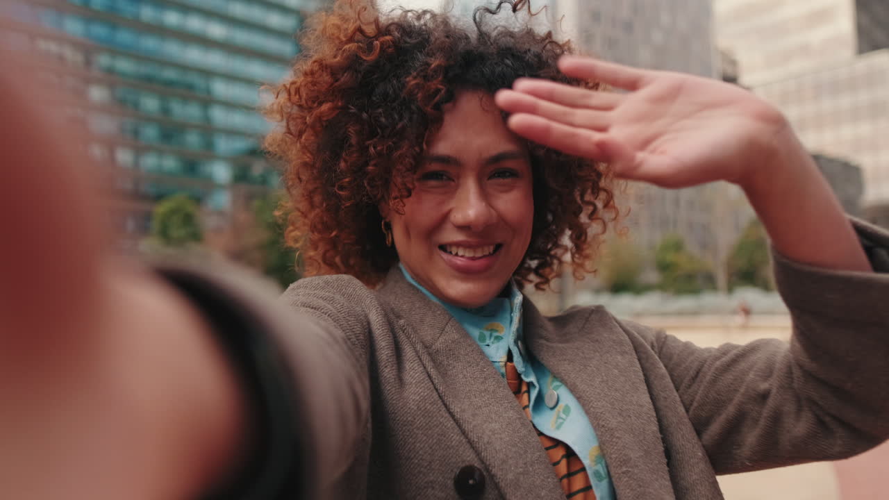 Happy Young Woman Waving on Video Call