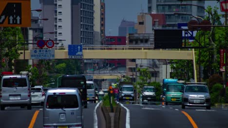 a timelapse of the traffic jam at the urban street in tokyo long shot