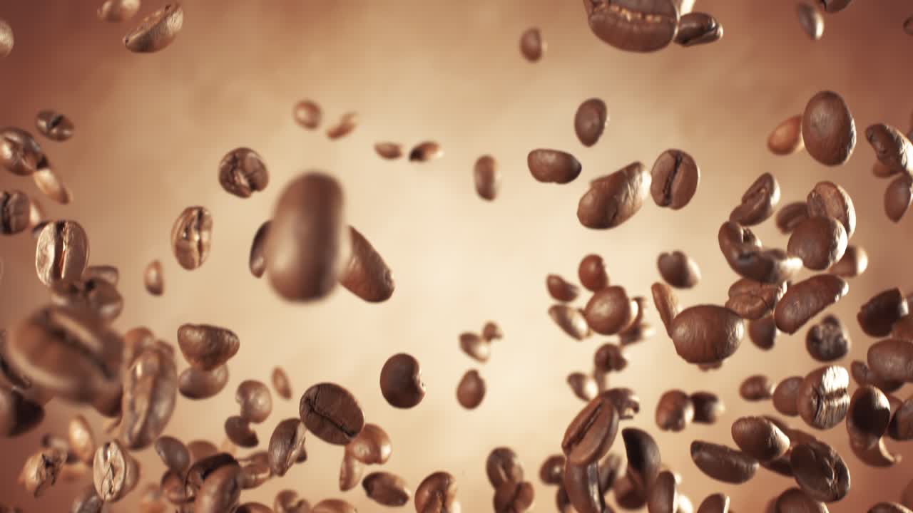 Fragrant coffee beans soar in the frame. Coffee beans shot on super slow motion camera 1000 fps
