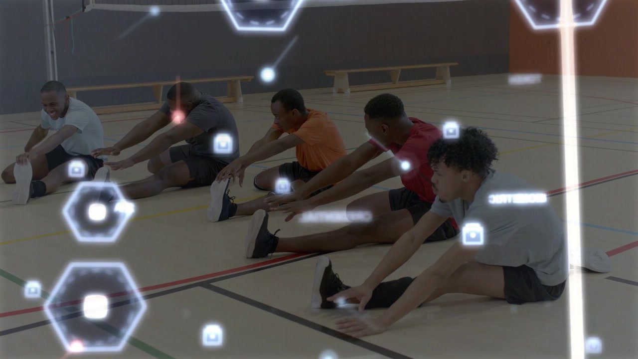 Male athletes at warmup start, doing seated reaches in gym, hex HUD drifting, partly obscuring them