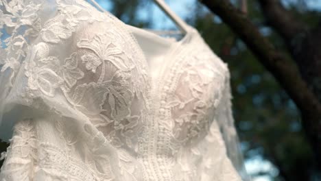 close-up view of the bride's wedding white dress with lace