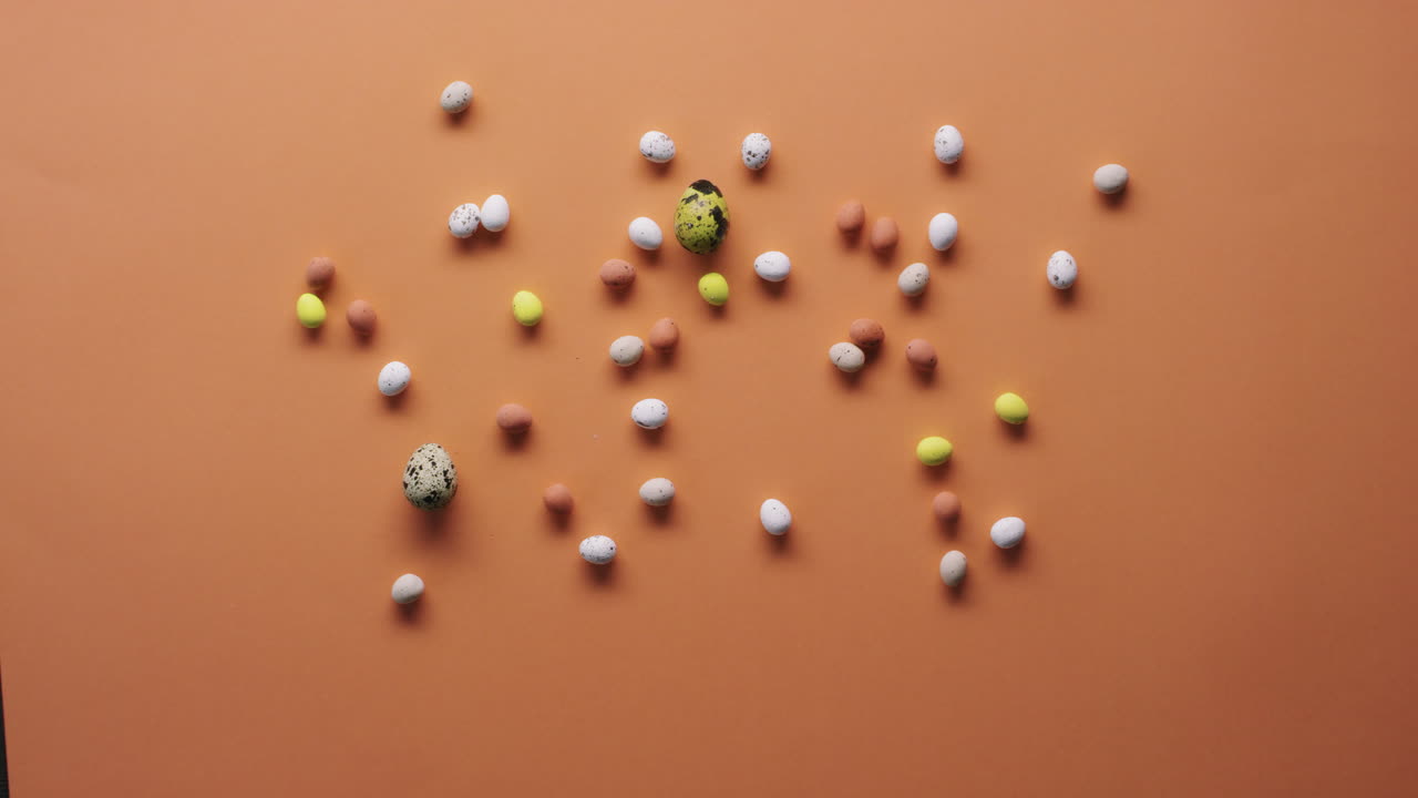 Top View of Dyed Quail Eggs and Easter Candy