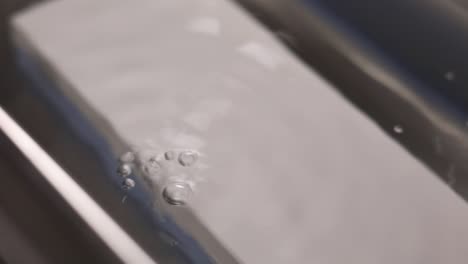 wet stone in water