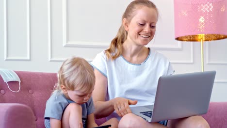 mother and child working from home