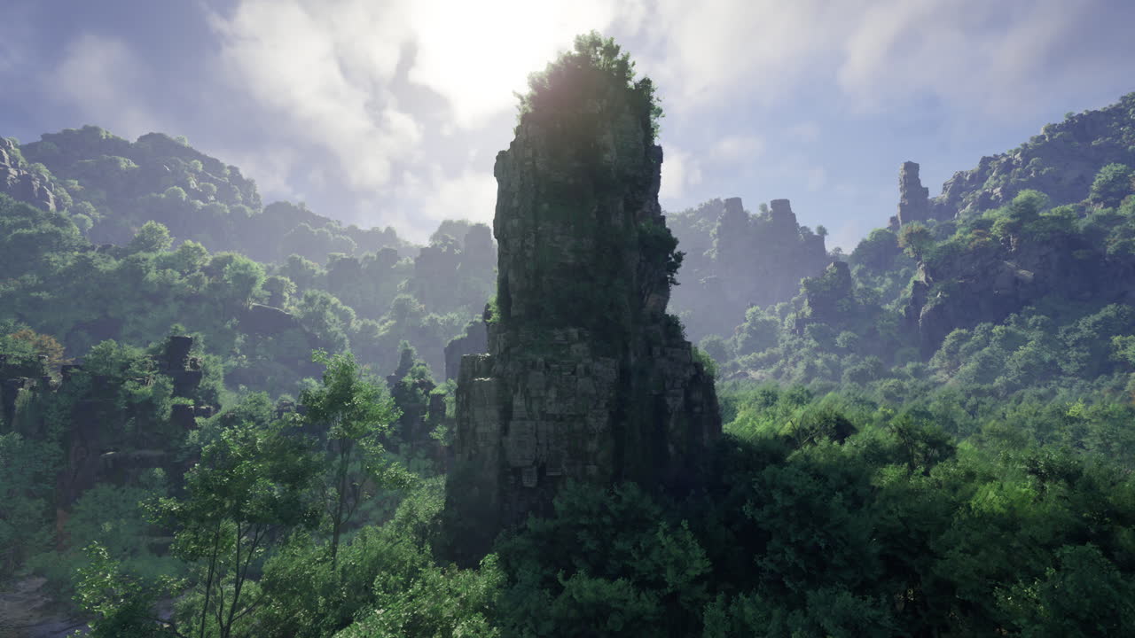 Majestic rock formation surrounded by lush greenery in a mountainous terrain