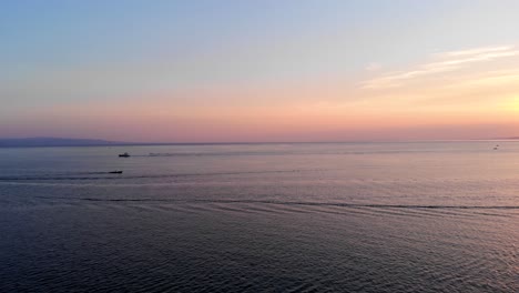 Aerial-flight-over-Marmara-Sea-through-boats,-Balikesir,-Turkey