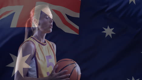 animation of flag of australia over caucasian female basketball player