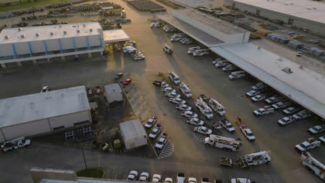 aerial view of electric and gas workers leaving the station, sunrise in houston
