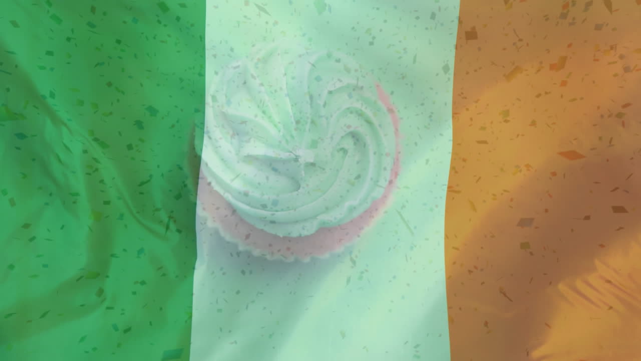 кексы, вращающиеся на фоне ирландского флага с падающими цифровыми частицами