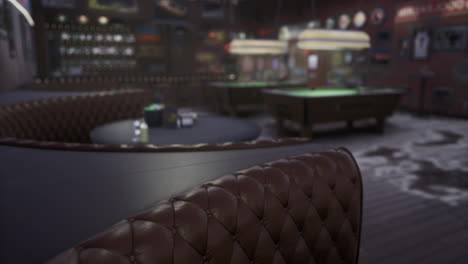 cozy game room with plush seating and pool tables under soft lighting