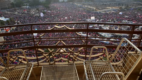 view from a balcony overlooking protestors in tahrir square in cairo egypt 1