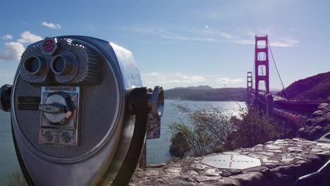 coin-operated binoculars with golden gate bridge in california, usa