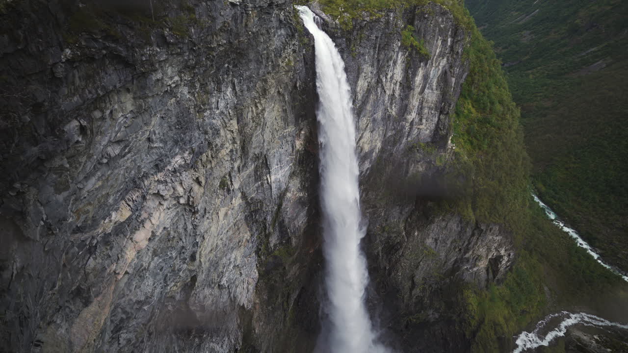 Majestic Waterfall Cascading Down a Cliffside in Norway
