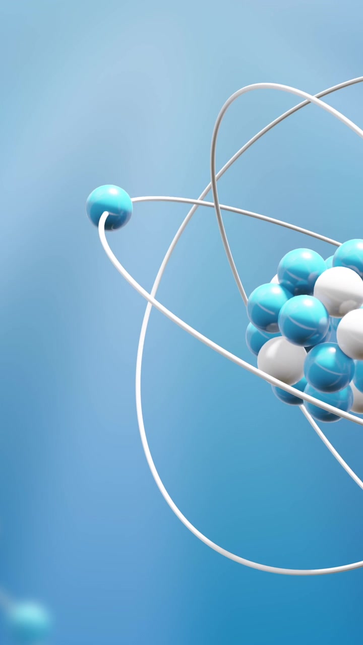 Animation of atom models spinning on blue background