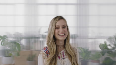 portrait-of-beautiful-blonde-business-woman-intern-laughing-cheerful-looking-at-camera-enjoying-working-lifestyle-in-office-workpace-background