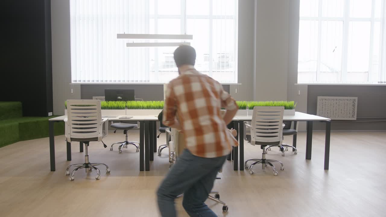 Cheerful employees have fun during break at workplace