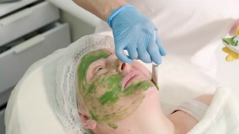 professional face care procedures in the modern cosmetology clinic. face mask applying