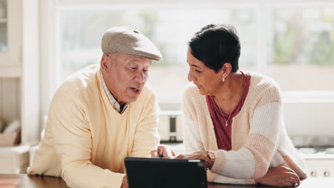 Tablet,-app-and-senior-couple-in-discussion