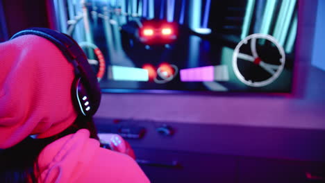 playing video game, woman wearing headphones and holding controller in living room, copy space