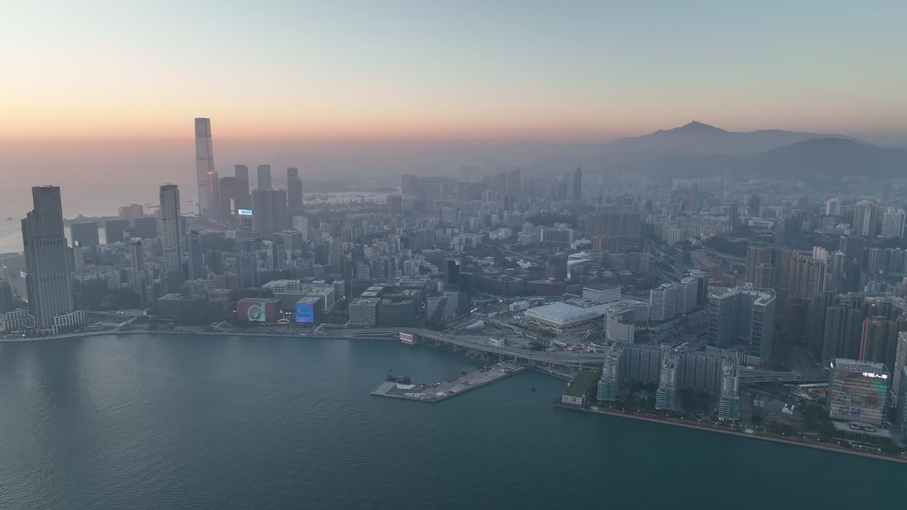 imágenes aéreas en 4k de la ciudad de hong kong al atardecer
