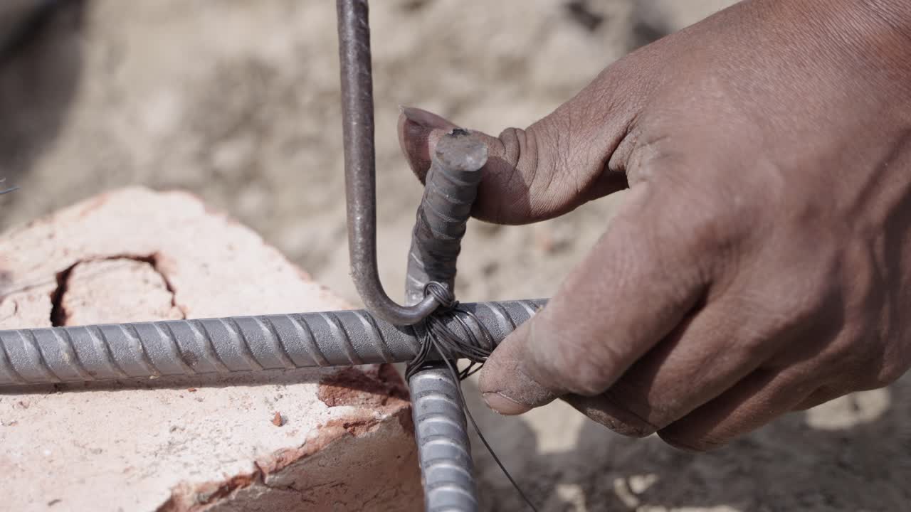 Iron rods being tied with wire
