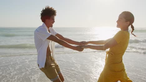 young couple by the sea