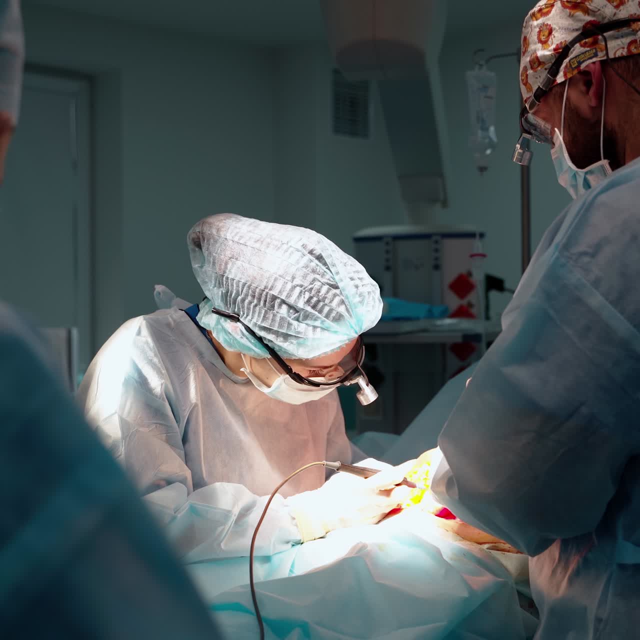 Plastic surgery. Professional doctors in a modern hospital. Abdominoplasty.